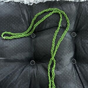 Green colored braided beads necklace